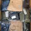 The photo shows a package with clothing in the category AM.