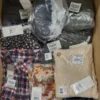The photo shows a package with clothing in the category YA.
