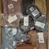 The photo shows a package with clothing in the category YA.