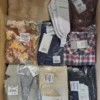 The photo shows a package with clothing in the category YA.