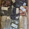 The photo shows a package with clothing in the category YA.
