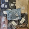 The photo shows a package with clothing in the category YA.
