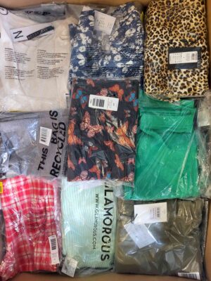 The photo shows a package with clothing in the category AR.