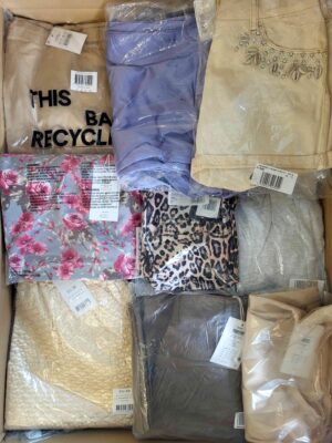 The photo shows a package with clothing in the category AR.