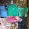 The photo shows a package with clothing in the category AR.