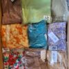 The photo shows a package with clothing in the category AR.