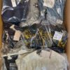The photo shows a package with clothing in the category AP.