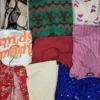 The photo shows a package with clothing in the category SN.