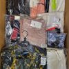 The photo shows a package with clothing in the category AP.