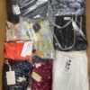 The photo shows a package with clothing in the category AP.