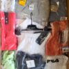 The photo shows a package with clothing in the category AW.