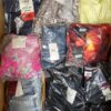 The photo shows a package with clothing in the category AP.