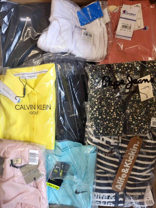 The photo shows a package with clothing in the category AW.