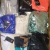 The photo shows a package with clothing in the category AW.