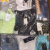 The photo shows a package with clothing in the category AW.