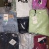 The photo shows a package with clothing in the category AW.