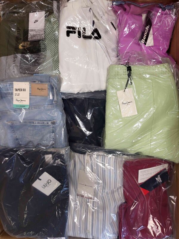 The photo shows a package with clothing in the category AW.
