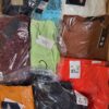 The photo shows a package with clothing in the category AW.