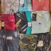 The photo shows a package with clothing in the category AW.