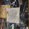 The photo shows a package with clothing in the category AW.