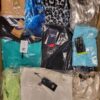 The photo shows a package with clothing in the category AW.