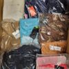 The photo shows a package with clothing in the category AW.
