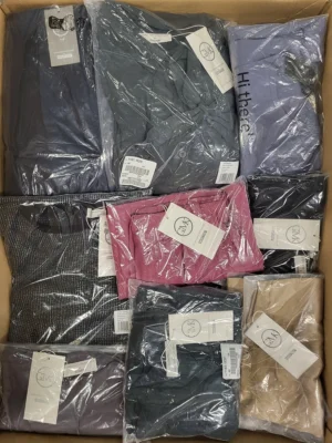 The photo shows a package with clothing in the category YA.