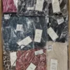 The photo shows a package with clothing in the category YA.