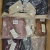 The photo shows a package with clothing in the category YA.