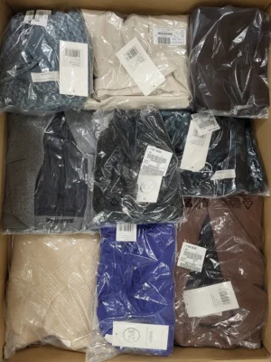 The photo shows a package with clothing in the category YA.
