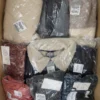 The photo shows a package with clothing in the category YA.