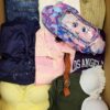 The photo shows a package with clothing in the category BSN.