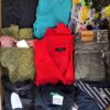 The photo shows a package with clothing in the category U.