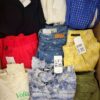 The photo shows a package with clothing in the category U.