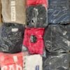 The photo shows a package with clothing in the category D.