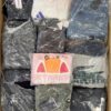 The photo shows a package with clothing in the category D.