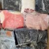The photo shows a package with clothing in the category D.