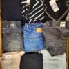 The photo shows a package with clothing in the category U.