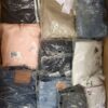 The photo shows a package with clothing in the category D.