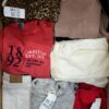 The photo shows a package with clothing in the category U.