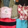 The photo shows a package with clothing in the category U.