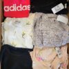 The photo shows a package with clothing in the category U.