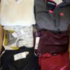 The photo shows a package with clothing in the category U.