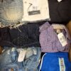 The photo shows a package with clothing in the category U.
