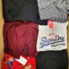 The photo shows a package with clothing in the category U.