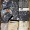 The photo shows a package with clothing in the category D.