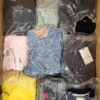 The photo shows a package with clothing in the category D.