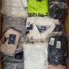 The photo shows a package with clothing in the category D.