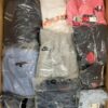 The photo shows a package with clothing in the category D.