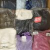 The photo shows a package with clothing in the category D.